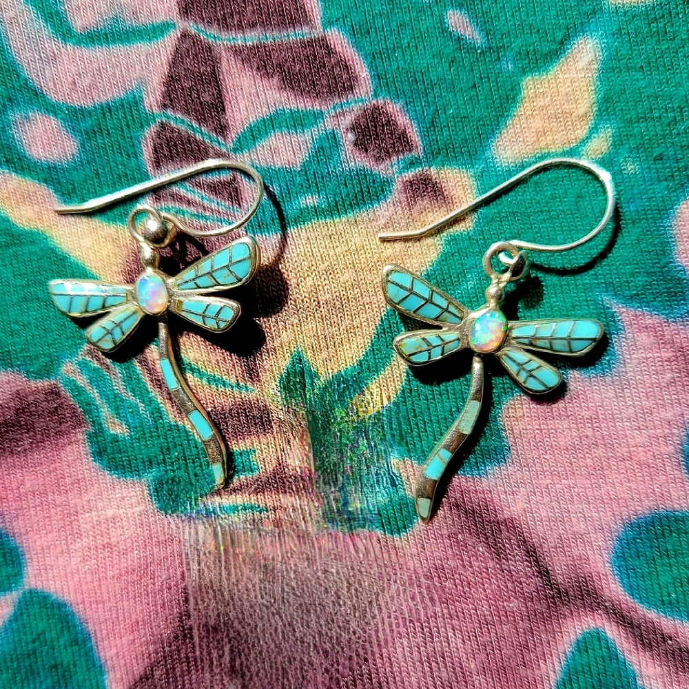 Beautiful, sterling dragonfly earrings with precious stones.